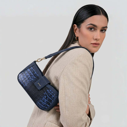 Kaia Croc Hand Burnished Leather Mini Handbag Model by side Steel Blue
