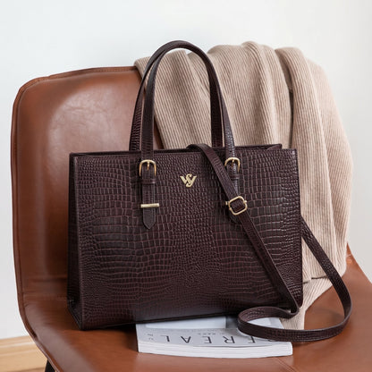 Sienna Croc Embossed Leather Womens Laptop Tote placed on chiar Oxblood Brown