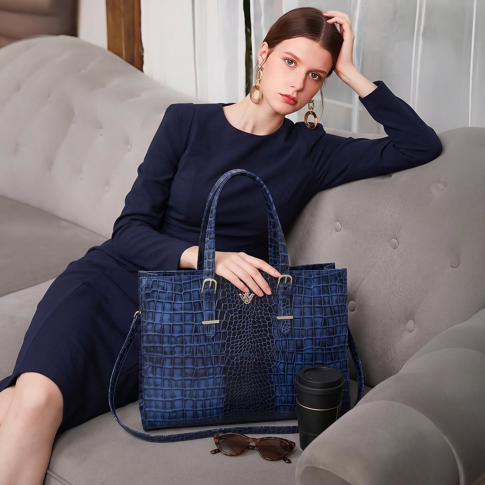Sienna Elite Croc Hand-Burnished Leather Women Laptop Tote sitting on sofa Steel Blue